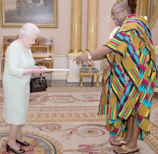 Mr Victor Emmanuel Smith presenting his letters to Her Majesty the Queen of England, Queen Elizabeth II, at the Buckingham Palace in London.